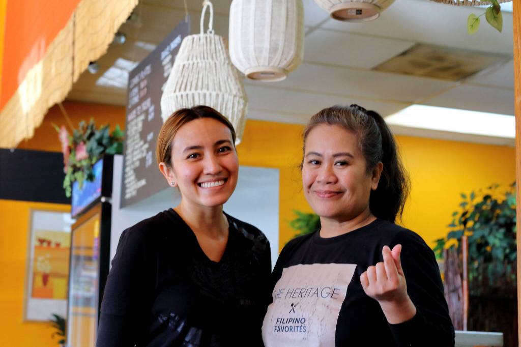 Kaye Tabalbag and Annabelle Tabalbag Cortes at the Heritage. Kaye and her husband Robert Guieb own the restaurant and her mother Annabelle helps out. Photo by Keelin Everly-Lang / the Mirror
