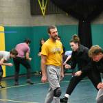 Shane Ornufer talks with Bryce Rowland as practice gets underway. Ben Ray / The Reporter