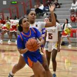 Kyra Thomas makes a layup against Thomas Jefferson. Photos by Ben Ray / The Reporter