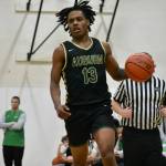 Miles Henry scored 25 points in the win for Auburn over Kentwood. Ben Ray / The Reporter