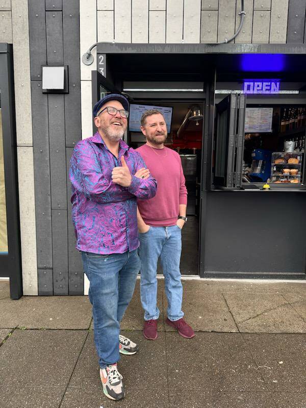 Josh Brugger and his friend and business partner Tim Larson in front of the coffee shop they opened on Jan. 5. Courtesy photo