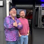 Josh Brugger and his friend and business partner Tim Larson in front of the coffee shop they opened on Jan. 5. Courtesy photo