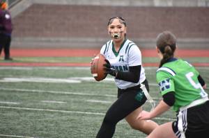 Fele Gasetoto rolls out of the pocket looking for a receiver. Ben Ray / The Reporter