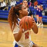 Kyra Thomas goes to the basket. Ben Ray / The Reporter