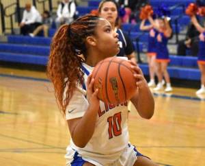 Kyra Thomas goes to the basket. Ben Ray / The Reporter