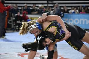 Tenaia Guess wrestles for Auburn Mountainview. Ben Ray / The Reporter