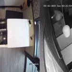 Left to right: The burglar checking the cash register for money and the burglar jumping out of the window that they broke to enter the business. (Courtesy photos)