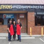 Pictured left to right: Bill, Nina and Tom Contoravdis, co-owners of Athens Pizza and Pasta, pose for a photo in front of their restaurant. File photo