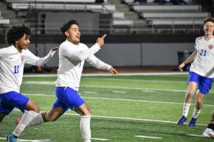 Benji Toscano celebrates his goal against Kent-Meridian. Ben Ray / The Reporter