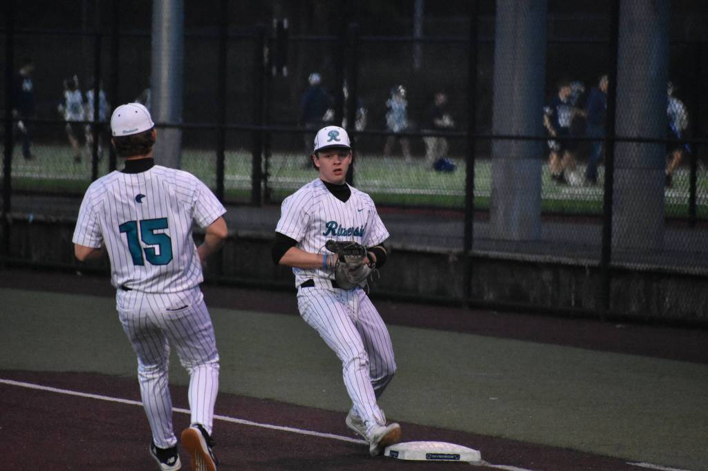 Caleb Anardi runs to touch first base after fielding a groundball. Ben Ray / The Reporter