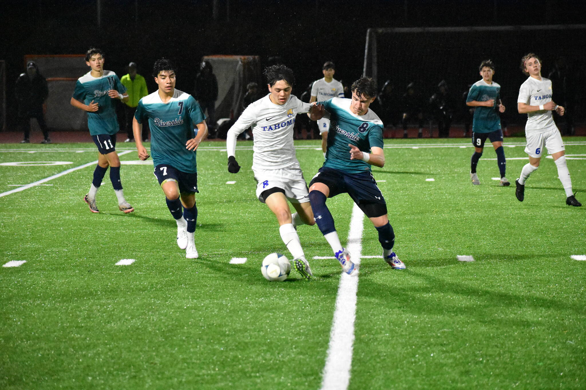 Tima Vereminy battles for the ball against Tahoma. Ben Ray / The Reporter