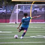 Daniel Hernandez kicks the ball downfield for Auburn Riverside. Ben Ray / The Reporter