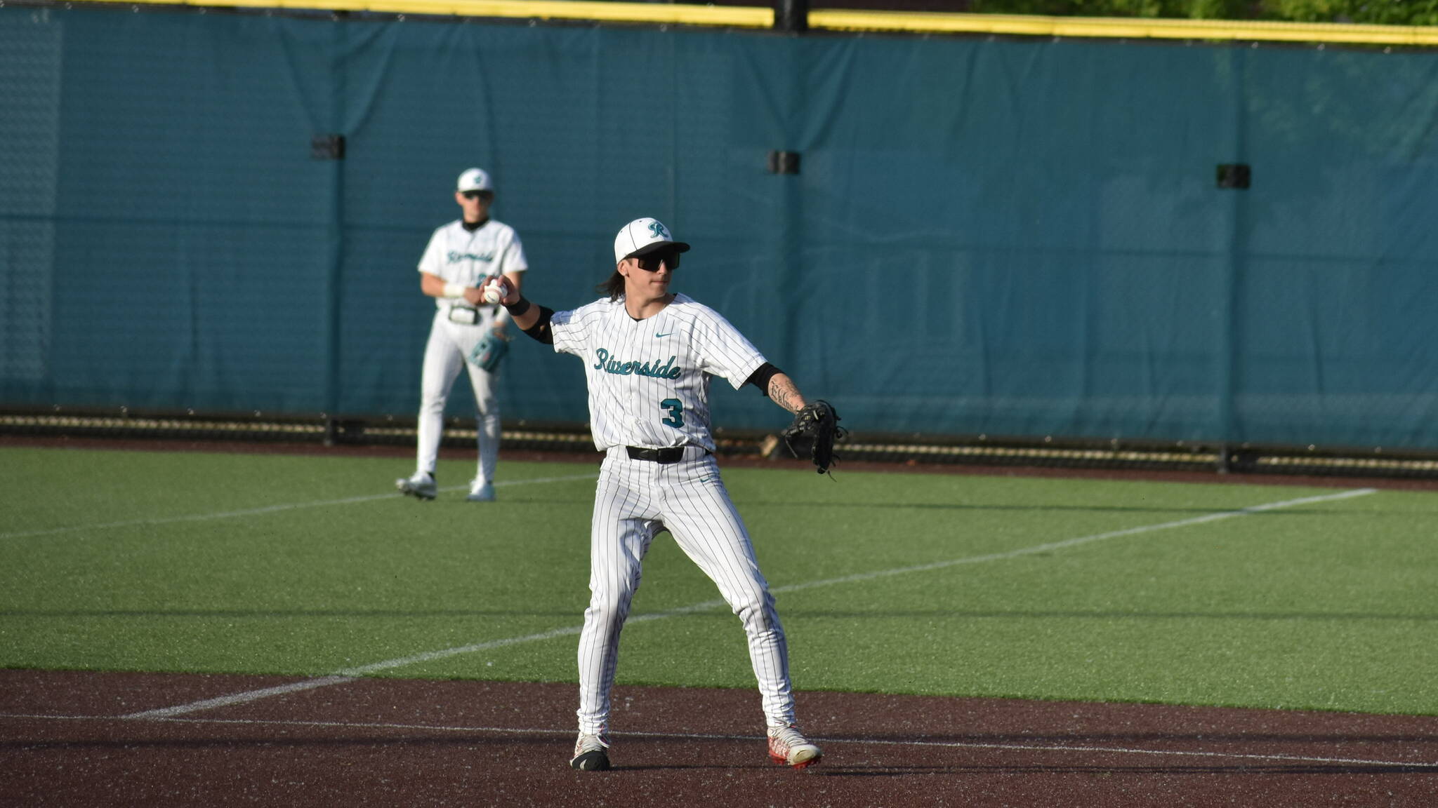 Peyton Eklund makes a play at second base and throws to first. Ben Ray / The Reporter