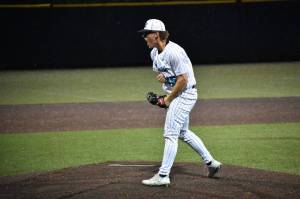 Cameron Bain lets a yell after ending the game against Kentwood. Ben Ray / The Reporter