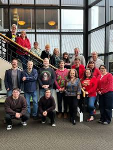 A group photo from Dec. 2024 of Sound Publishings King County news team that produces local newspapers including the Auburn Reporter. File photo