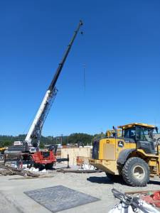 Sound Transit will add a new tower crane to the Sound Transit parking garage construction site 1st Street Northwest and A Street Northwest on June 3. Photo by Robert Whale/Auburn Reporter