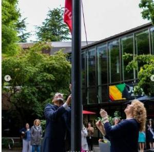 Auburn celebrates its second observance of Juneteenth from 10 a.m. to 3 p.m. June 22 at Les Gove Park, 910 9th St. SE. In the photo, Lonnie Washington Sr. and Auburn Mayor Nancy Backus raise the flag to kick off last years Juneteenth celebration. Courtesy photo/City of Auburn