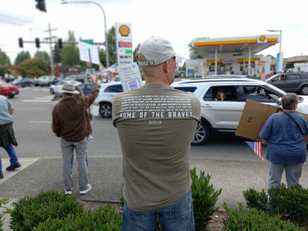 Photo by Robert Whale/Auburn Reporter 
This man wore his patriotism on the back of his shirt.