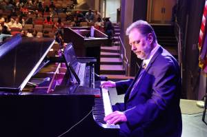 Daren Hoerth played the piano at the Auburn Performing Arts Center while families were being seated before the West Auburn HS graduation ceremony on June 14. Courtesy photo