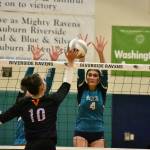 Auburn Riverside player goes up for a block against Sumner. Ben Ray / The Reporter
