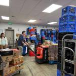Volunteers work to keep the Auburn Food Bank running.