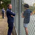 Auburn Riversides head coach Tyler Parsons speaks with Albert Yang. Nathan Hyun / The Reporter