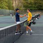 Auburn Riversides Evan Ly and Tahomas Owen Kizen shake hands after match. Nathan Hyun / The Reporter