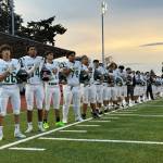 Auburn Trojans stand for the national anthem. Photo provided by Nathan Hyun