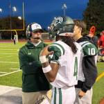Head Coach Aaron Chantler speaks with quarterback Isaiah Avelar. Photo provided by Nathan Hyun
