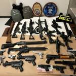U.S. Attorney Charles Neil Floyd said more than 34 firearms were seized in the arrests. Photo provided by the office of U.S. Attorney Charles Neil Floyd