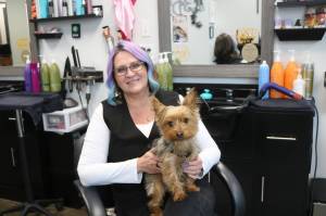 Third Dimension Salon owner Deana McFarlane and salon director of cuddles Bodhi. Third Dimension has won its third Best of Auburn award. Photo by Bailey Jo Josie/Sound Publishing