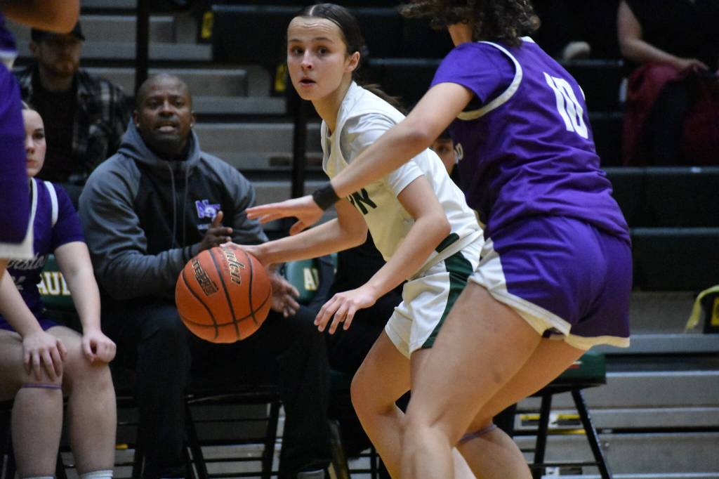 Jordyn Schoenbachler dribbles the ball for Auburn High. Ben Ray / The Reporter
