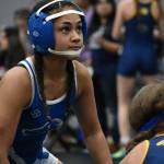 Auburn Mountainviews Fia Daniels looks at the ref after her win at Kentwood. Ben Ray / The Reporter
