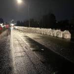 Washington State Department of Transportation crews placed hundreds of sandbags Sunday, Dec. 14 and overnight into the early morning of Monday, Dec. 15 along Highway 167 in Kent and Auburn to redirect flooding from the Green River. COURTESY PHOTO, WSDOT