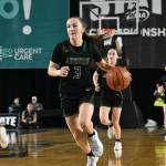 Auburns Avery Hansen dribbles the ball up the floor against Woodinville.