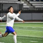 Auburn Mountainviews Benji Toscano celebrates his goal against Kent-Meridian. Photos by Ben Ray/ The Reporter