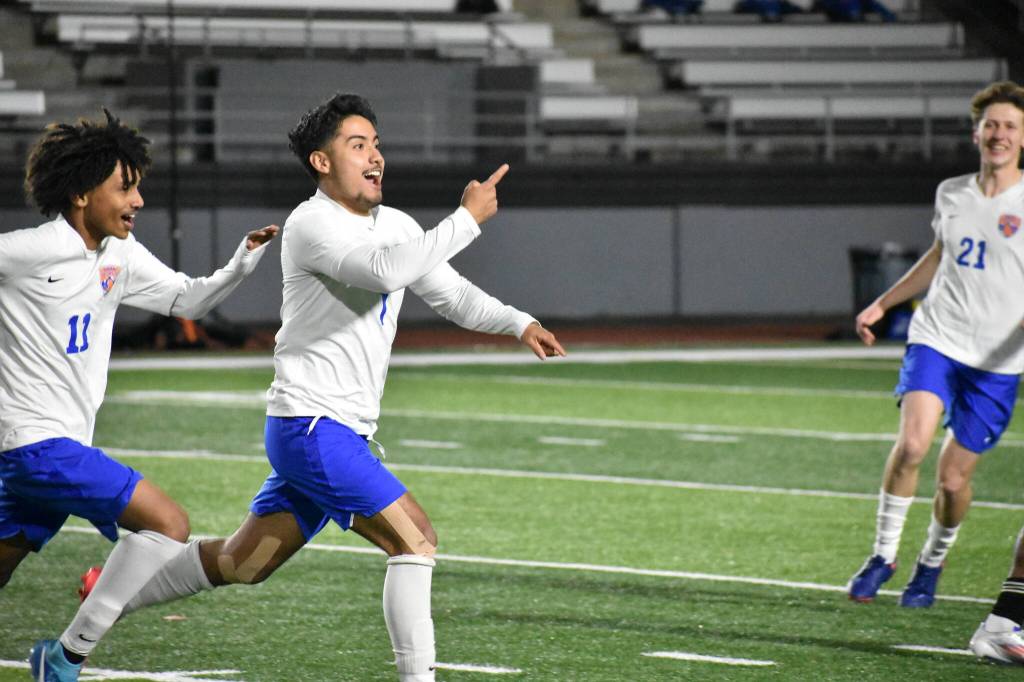 Auburn Mountainviews Benji Toscano celebrates his goal against Kent-Meridian. Photos by Ben Ray/ The Reporter