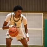 Daniel Johnson eyes down the defense against Kentwood inside the Bob Jones Gymnasium. Ben Ray / The Reporter