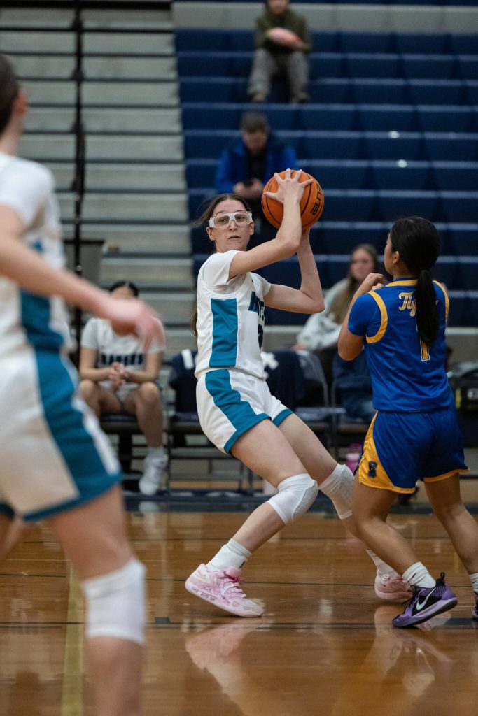 Aurora Lowe looks to pass the ball to a teammate. Maria Dorsten Photography