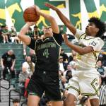 Rainier Denoso fights through contact against Kentridge. Ben Ray / The Reporter