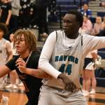 Auburn Riverside senior Diing Diing posts up a player from Yelm. Ben Ray / The Reporter