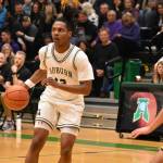 Miles Henry looks for a teammate against Puyallup. Ben Ray / The Reporter