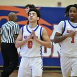 Kolven Posey (left) and Markel Lowery (right) react to the win in overtime. Ben Ray / The Reporter