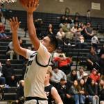 Kai Williams makes a layup for Muckelshoot. Ben Ray / The Reporter