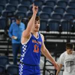 Cody Bennion holds up his hand to call the defense after making a 3-pointer. Ben Ray / The Reporter