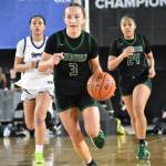Avery Hansen running the floor on a fast break for Auburn. Ben Ray / The Reporter