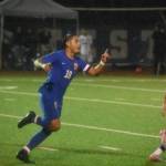 Benji Toscano waves his finger in the air after scoring his second goal of the night against Kent-Meridian. Ben Ray / The Reporter