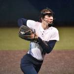 Kylee Curtis delivers a pitch for Auburn Riverside against Kentwood. Ben Ray / The Reporter