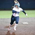 Katelyn Taylor runs to third base for Auburn Riverside. Ben Ray / The Reporter