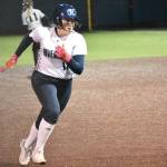 Olivia Olson runs to third base for Auburn Riverside. Ben Ray / The Reporter